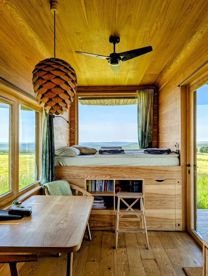Bedroom of the glamping tiny house at Na Malém Háji – comfortable bed