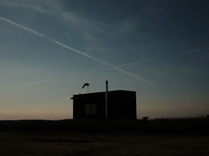 Outdoor seating area by the glamping tiny house at Na Malém Háji